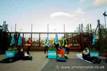 Climate activists blockade nuclear base with giant plant pots - St Helens Star