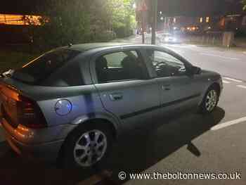 Car stopped after driving into police scene in Atherton