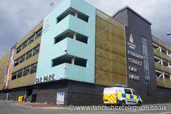 Police called to 'incident' in Blackburn town centre as woman falls from car park