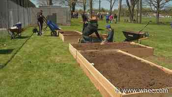 Northeast College High School students break ground on outdoor classroom