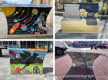 Why have the benches in this town centre been painted like children's books?