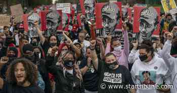 Hundreds follow Daunte Wright's family in a march through Brooklyn Center