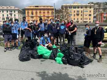 I ragazzi di Genova Cleaner puliscono la spiaggia di Voltri invasa dalle mascherine - Telenord
