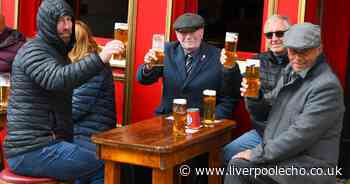 Drinkers brave bad weather to enjoy outdoor fun in city centre