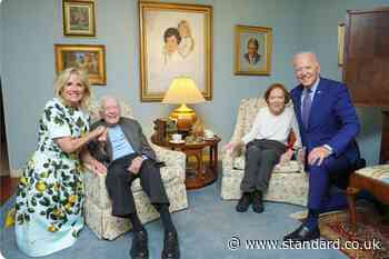 Why do the Carters look so small alongside the Bidens?