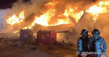 Morning fire destroys building near downtown Saskatoon - Global News