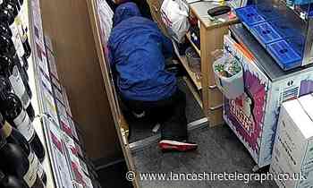 Hooded man threatened Bargain Booze shopworkers with screwdriver