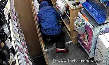 Hooded man threatened Bargain Booze shopworkers with screwdriver