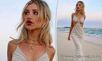 Model goes viral as she shows off a lot of underboob in a VERY revealing dress on the beach