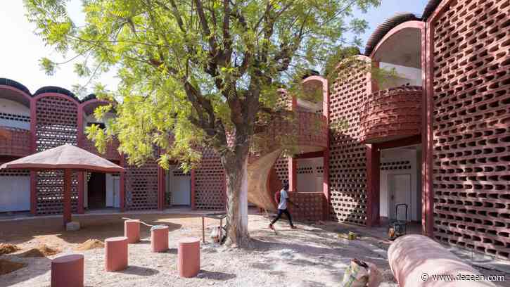 Manuel Herz encloses curvilinear hospital in Senegal with lattice brickwork