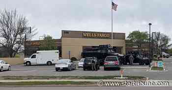 Four hostages freed, but standoff continues after St. Cloud bank robbery