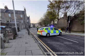 Armed officers lock down Aberdeen street amid ‘disturbance’ as man arrested... - The Scottish Sun