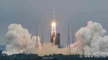 China says there is little threat of rocket causing harm as it returns to Earth