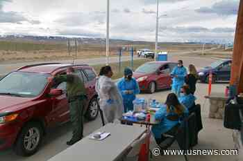 The Latest: Bar Owner Arrested for Fake Vaccination Cards