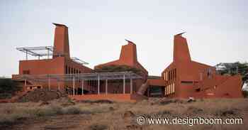 tall ventilation towers in kéré architecture's kenyan education campus mimic termite mounds - Designboom