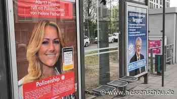 Adbusting in Frankfurt: Polizeikritik statt Dating-App-Werbung mit Helene Fischer - hessenschau.de