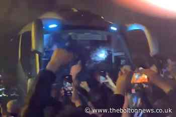 Jubilant Bolton Wanderers fans welcome home team bus last night