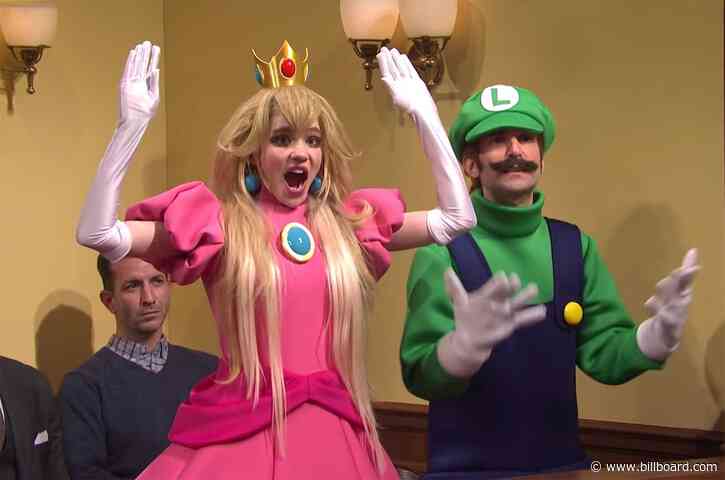 Grimes Nails it as Princess Peach Alongside Elon Musk as Wario in ‘SNL’ Super Mario Murder Trial Skit: Watch