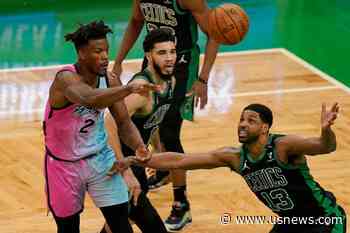 Butler Strong Down Stretch, Heat Hold off Celtics 130-124