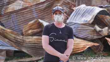 Lives in limbo as once precious family homes still lie in piles ash and debris