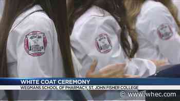 Wegmans School of Pharmacy celebrates first-year students with white coat ceremony