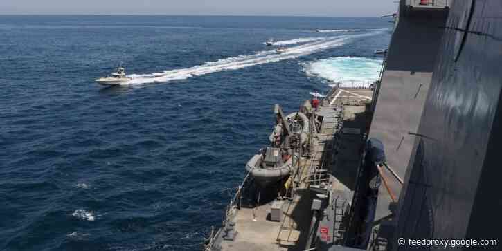 A US Coast Guard ship fired 30 warning shots from a machine gun during an 'unsafe' encounter with Iranian fast-attack boats
