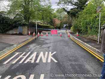 Flooding closes road in Bolton as water shut off