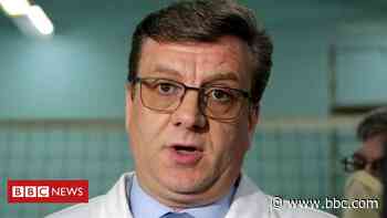 Russian top doctor who treated Navalny emerges from forest - BBC News