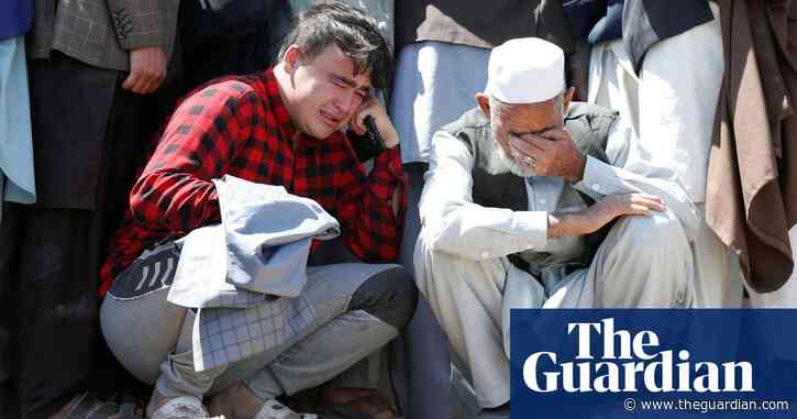 Afghan families bury schoolgirls killed in Kabul blasts – video