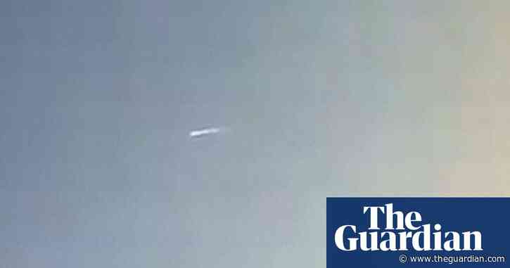 Footage shows debris from China’s largest rocket falling to Earth – video