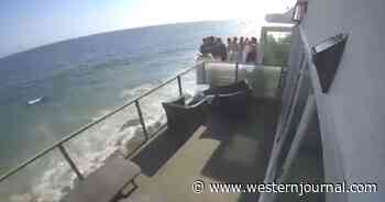 Watch: Security Camera Captures Jaw-Dropping Moment Crowded Balcony Collapses