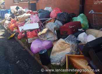 Piles of household rubbish dumped overnight on Blackburn street