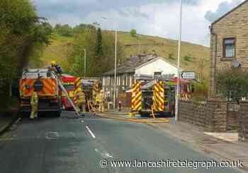 Fire crews rush to road sweeper fire on Grane Road