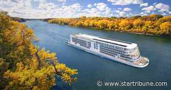 Viking cruising into St. Paul for Mississippi River tours in 2022