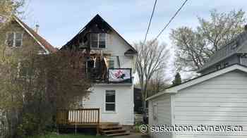 Saskatoon firefighters rescue family cat while battling blaze