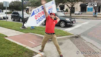 Professional Sign Spinning Acrobat Brings Smiles and Flair to the New Sport