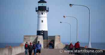 Duluth's Canal Park lighthouse: Free to right caretaker