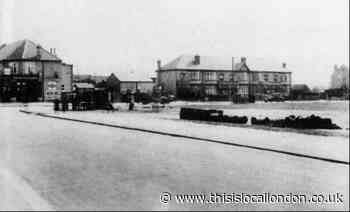 An occasional East London fairground pictured 90 years ago