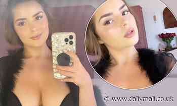 Demi Rose flaunts her eye-popping cleavage in a racy sheer night dress