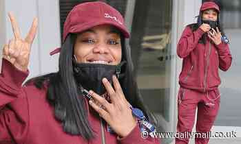 Lady Leshurr cuts a casual figure in a matching burgundy tracksuit for work at BBC Radio