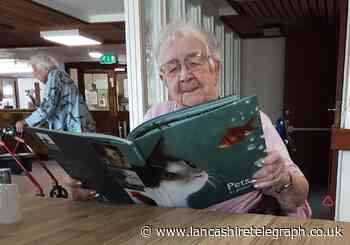 Specialist books donated to care home to engage and entertain dementia patients