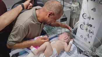 Video shows man who lost wife, 4 children to Israeli airstrike reunite with surviving infant son