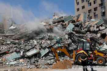 The Latest: Watchdog Seeks War Crime Probe of Media Bombing