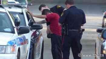 Saskatoon police say spitting suspects have forced increased use of disposable hoods