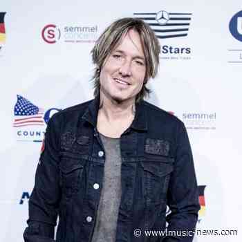 Keith Urban wanted to 'sit on the couch and eat chips' during lockdown