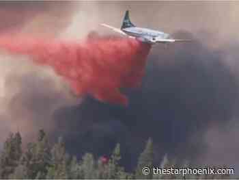 Watch: Water bombers tackle wildfire near Prince Albert
