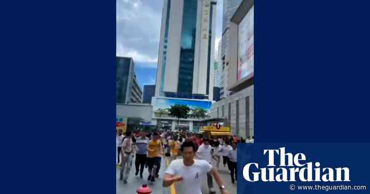 People flee in panic as 300-metre skyscraper wobbles in China – video