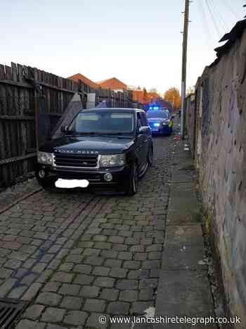 Accrington Range Rover driver hid under campervan