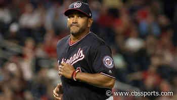 Nationals manager Dave Martinez throws first base after getting ejected in argument with umpire