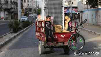 Palestinians claim victory in ceasefire as Israel issues warning to Hamas